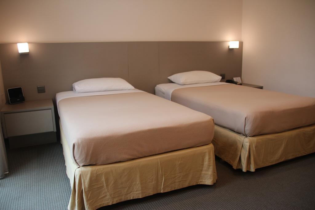 Classique Hotel Σιγκαπούρη Δωμάτιο φωτογραφία